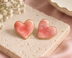 Load image into Gallery viewer, Anti-tarnish pink marbled heart stud earrings with gold-tone border