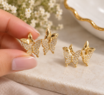 Load image into Gallery viewer, Gold butterfly earrings with sparkling crystal embellishments