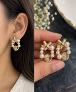 Load image into Gallery viewer, Anti-tarnish floral earrings with white pearl accents
