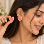 Load image into Gallery viewer, Glossy pink heart stud earrings with delicate gold-tone edging
