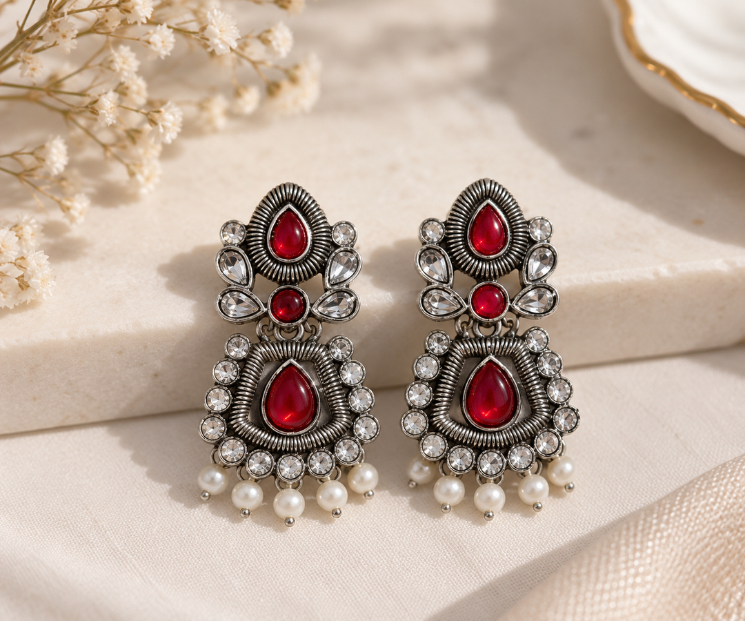 Oxidised red stone statement earrings with pearl drops