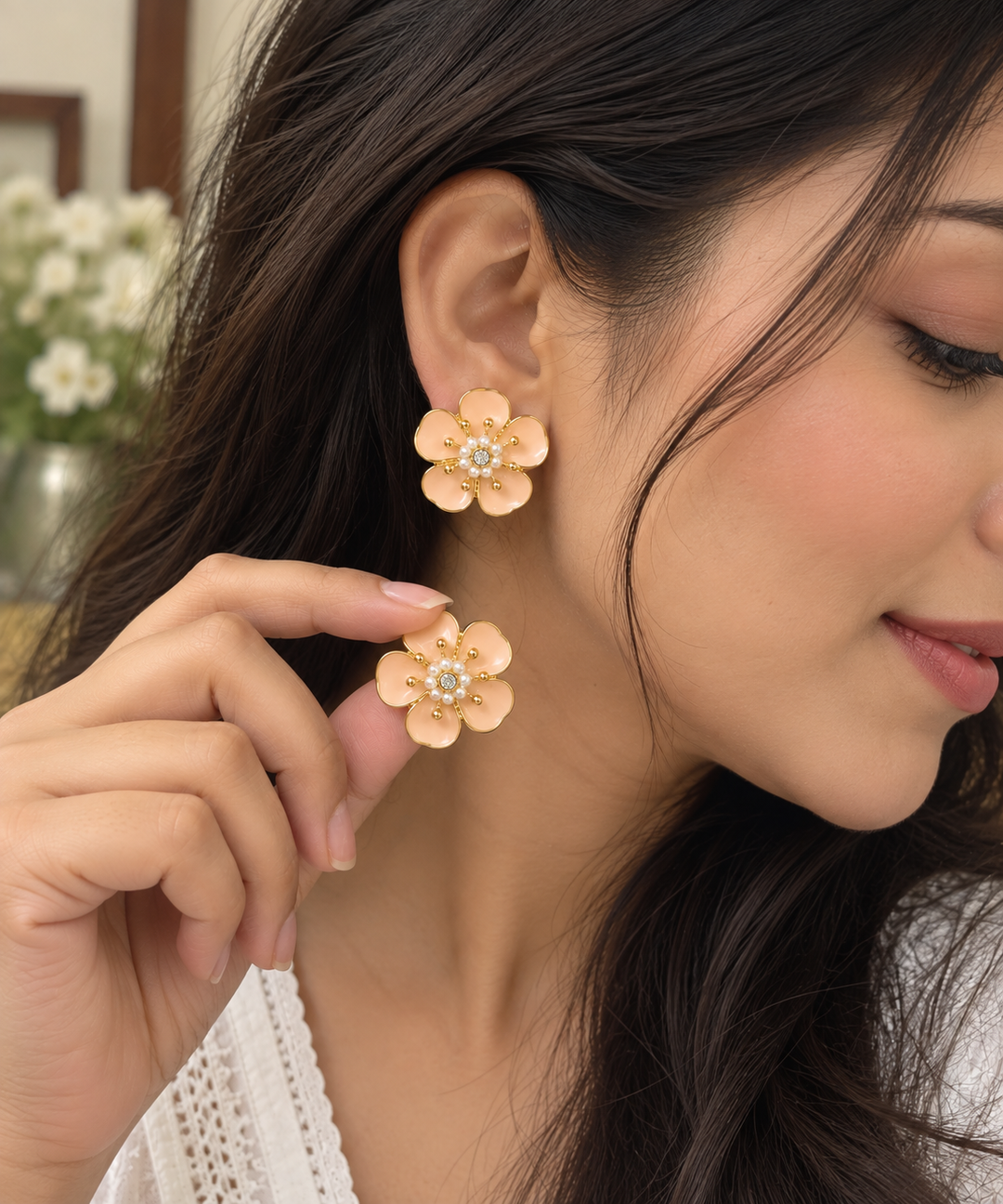 Peach pink enamel-style flower earrings with intricate centre detailing