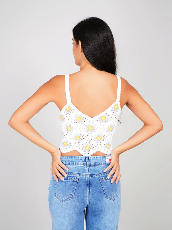 stylish white knit crop top featuring yellow flower crochet